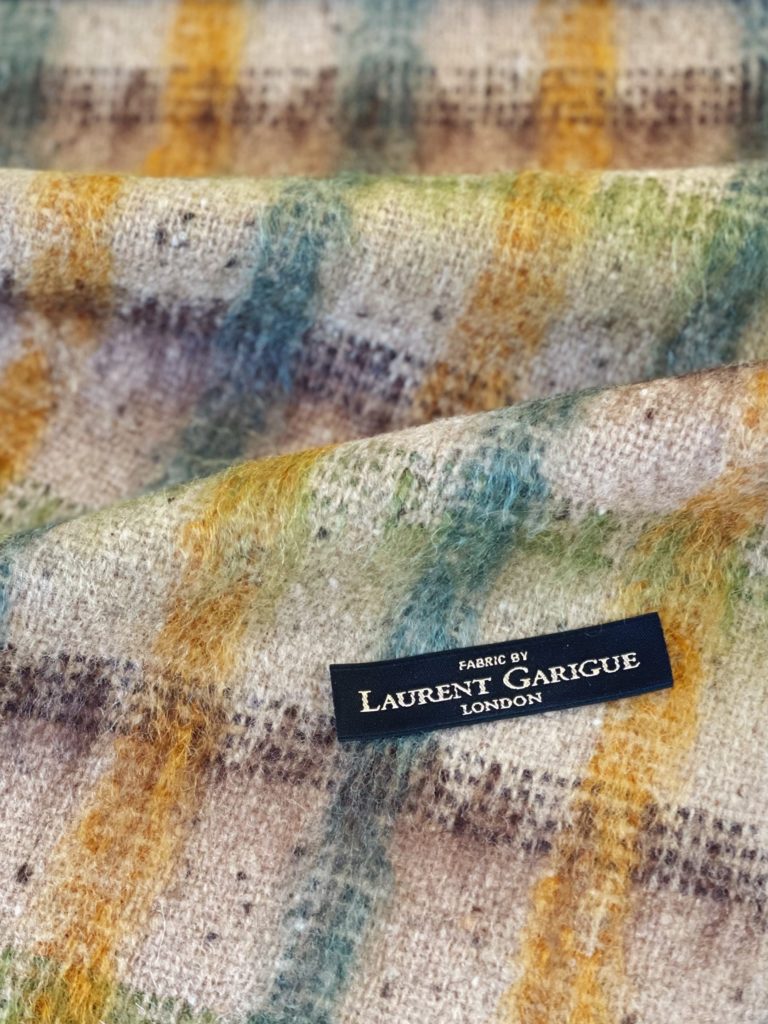 Laurent Garigue : Mohair over-checked tweed. Composition: 85% Wool 12% Mohair 3% Nylon