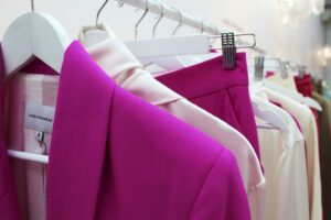 pink blazer on clothes stand