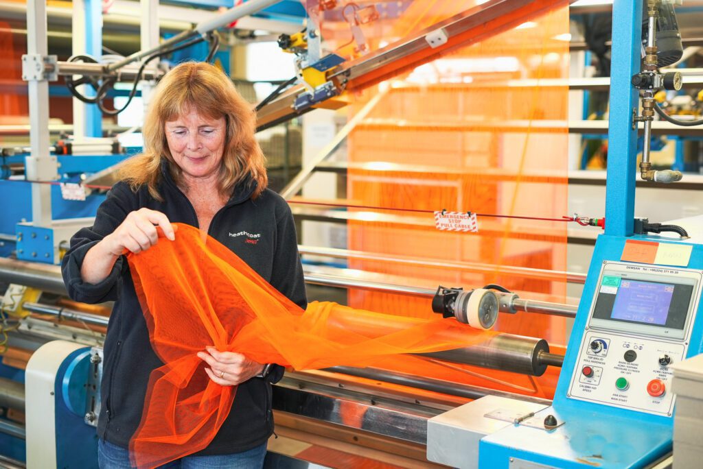 Heathcoat Fabrics Tulle fabric being inspected