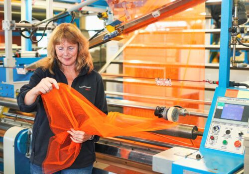 Heathcoat Fabrics Tulle fabric being inspected