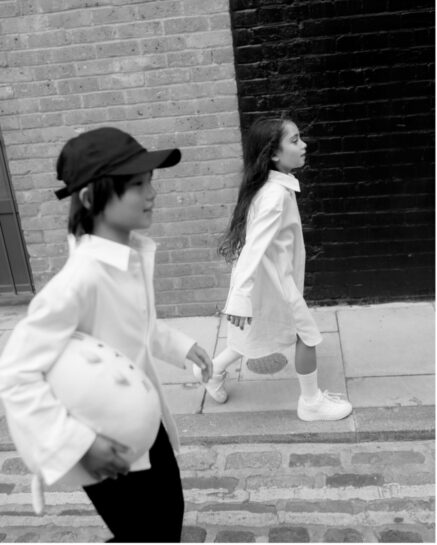 kids walking on a pavement