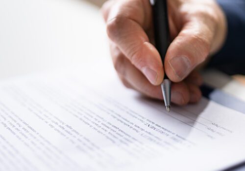 Lawyer Signing Business Contract Legal Document Paper