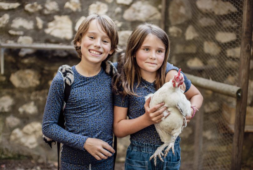 Morning Marvels- Children hugging and posing for a picture