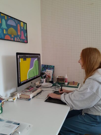 Rosie working on a computer as part of UKFT MADE IT internship